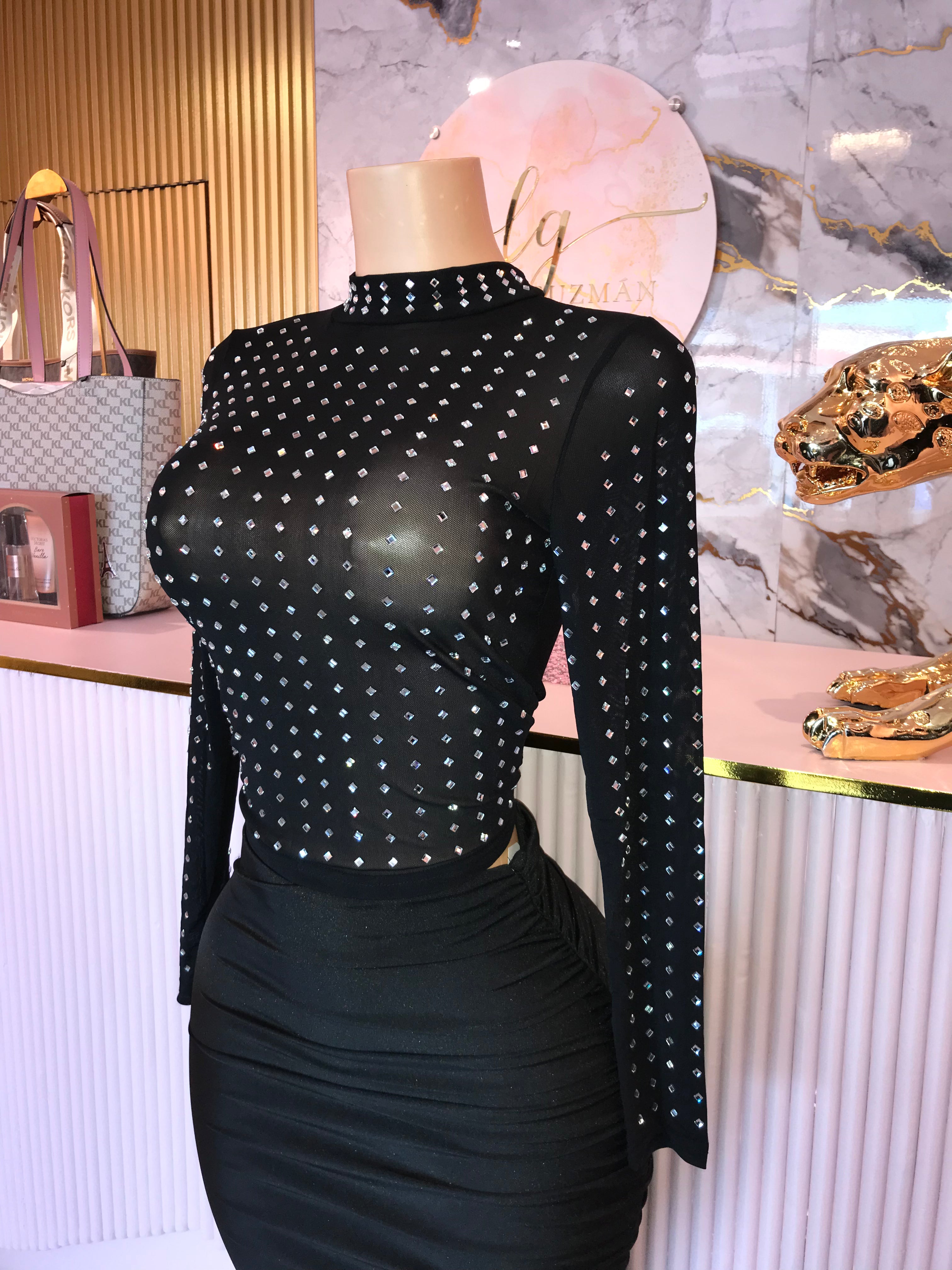 Blusa transparente con pedrería